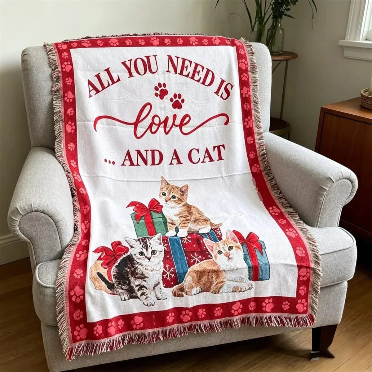 Sofatrekk og pledd med tegneseriekatt-motiv