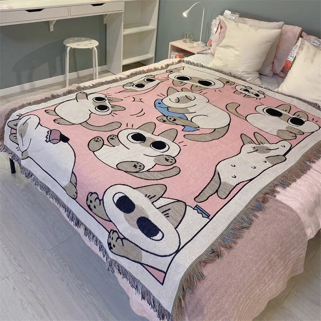 Rosa teppe med tegneseriekatt for énseters sofa